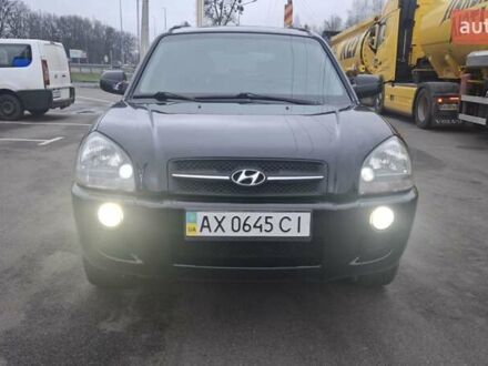 Черный Хендай Туксон, объемом двигателя 2.7 л и пробегом 263 тыс. км за 7450 $, фото 1 на Automoto.ua