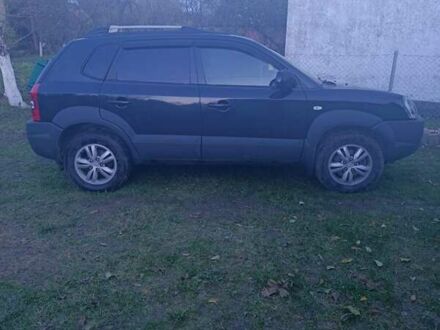 Черный Хендай Туксон, объемом двигателя 1.98 л и пробегом 298 тыс. км за 9300 $, фото 1 на Automoto.ua