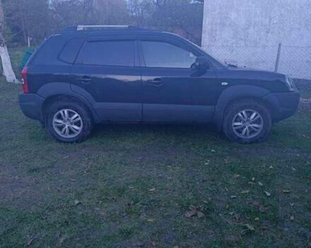 Черный Хендай Туксон, объемом двигателя 1.98 л и пробегом 298 тыс. км за 9300 $, фото 1 на Automoto.ua
