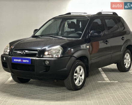 Черный Хендай Туксон, объемом двигателя 1.98 л и пробегом 129 тыс. км за 10600 $, фото 1 на Automoto.ua