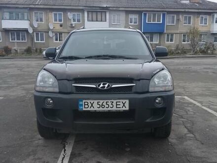 Черный Хендай Туксон, объемом двигателя 1.98 л и пробегом 214 тыс. км за 9100 $, фото 1 на Automoto.ua