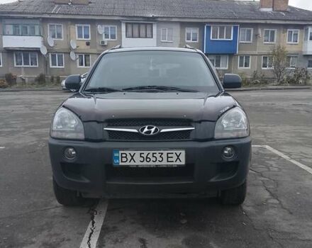 Черный Хендай Туксон, объемом двигателя 1.98 л и пробегом 214 тыс. км за 9100 $, фото 1 на Automoto.ua