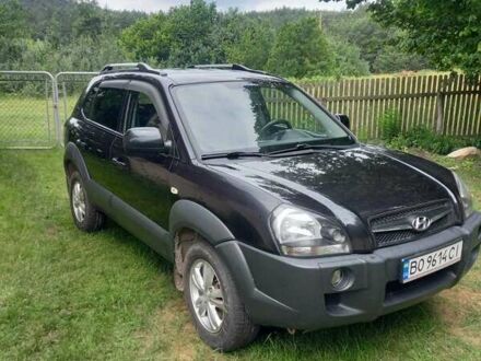 Черный Хендай Туксон, объемом двигателя 1.98 л и пробегом 220 тыс. км за 8500 $, фото 1 на Automoto.ua