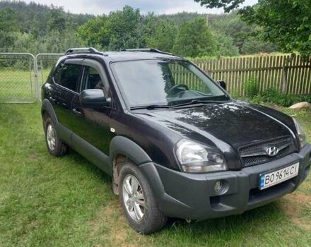 Черный Хендай Туксон, объемом двигателя 1.98 л и пробегом 220 тыс. км за 8500 $, фото 1 на Automoto.ua