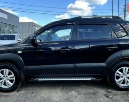 Черный Хендай Туксон, объемом двигателя 1.98 л и пробегом 186 тыс. км за 9500 $, фото 1 на Automoto.ua