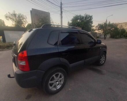 Черный Хендай Туксон, объемом двигателя 2 л и пробегом 290 тыс. км за 8500 $, фото 1 на Automoto.ua