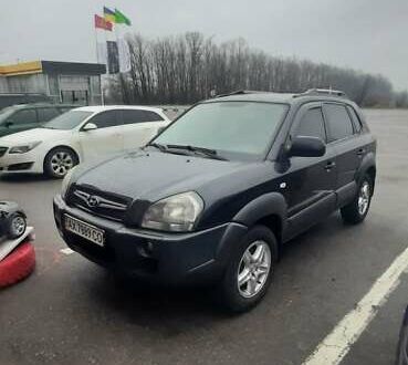 Черный Хендай Туксон, объемом двигателя 1.98 л и пробегом 282 тыс. км за 8000 $, фото 1 на Automoto.ua