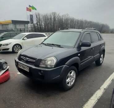 Черный Хендай Туксон, объемом двигателя 1.98 л и пробегом 282 тыс. км за 8000 $, фото 1 на Automoto.ua