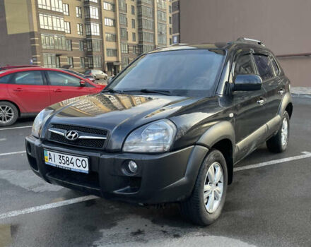 Черный Хендай Туксон, объемом двигателя 1.98 л и пробегом 180 тыс. км за 7950 $, фото 1 на Automoto.ua