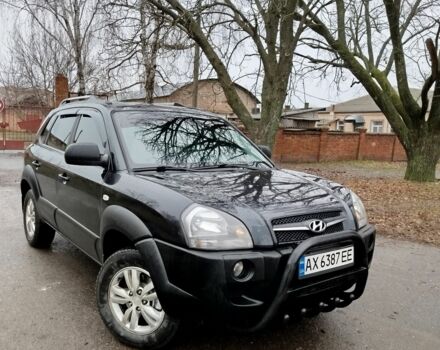 Черный Хендай Туксон, объемом двигателя 2 л и пробегом 160 тыс. км за 9600 $, фото 1 на Automoto.ua