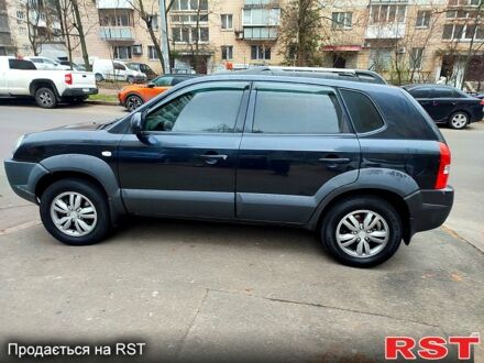 Черный Хендай Туксон, объемом двигателя 2 л и пробегом 258 тыс. км за 9000 $, фото 1 на Automoto.ua