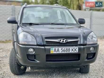 Черный Хендай Туксон, объемом двигателя 1.98 л и пробегом 158 тыс. км за 8200 $, фото 1 на Automoto.ua