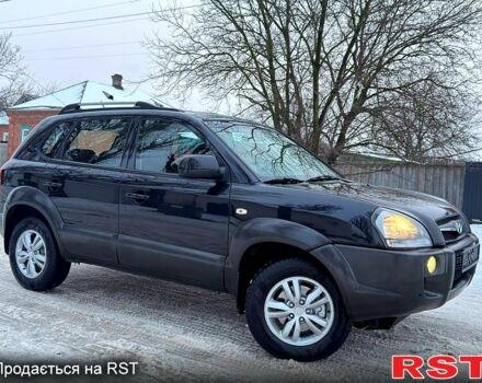 Черный Хендай Туксон, объемом двигателя 2 л и пробегом 115 тыс. км за 9980 $, фото 1 на Automoto.ua