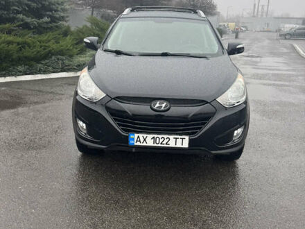 Черный Хендай Туксон, объемом двигателя 2.4 л и пробегом 143 тыс. км за 12000 $, фото 1 на Automoto.ua