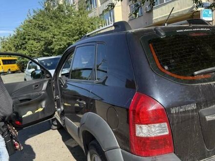 Чорний Хендай Туксон, об'ємом двигуна 1.99 л та пробігом 65 тис. км за 13500 $, фото 1 на Automoto.ua