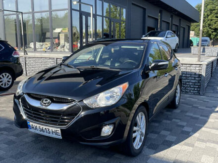 Черный Хендай Туксон, объемом двигателя 2.49 л и пробегом 165 тыс. км за 13500 $, фото 1 на Automoto.ua