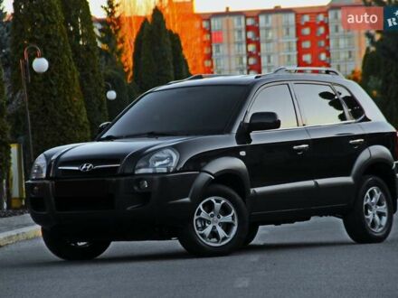 Чорний Хендай Туксон, об'ємом двигуна 2 л та пробігом 127 тис. км за 10800 $, фото 1 на Automoto.ua