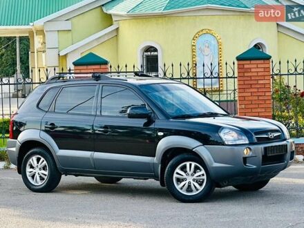 Черный Хендай Туксон, объемом двигателя 2 л и пробегом 119 тыс. км за 9600 $, фото 1 на Automoto.ua