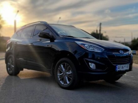 Черный Хендай Туксон, объемом двигателя 2.4 л и пробегом 130 тыс. км за 12400 $, фото 1 на Automoto.ua