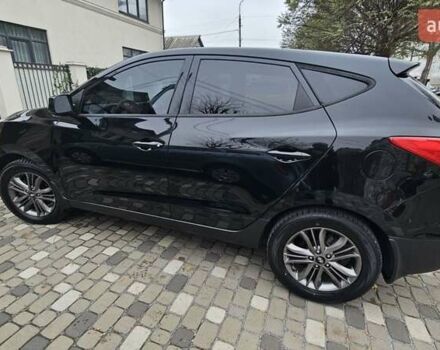 Чорний Хендай Туксон, об'ємом двигуна 2 л та пробігом 160 тис. км за 12300 $, фото 1 на Automoto.ua