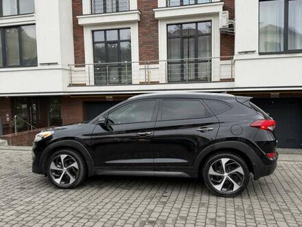 Черный Хендай Туксон, объемом двигателя 1.6 л и пробегом 123 тыс. км за 17500 $, фото 1 на Automoto.ua