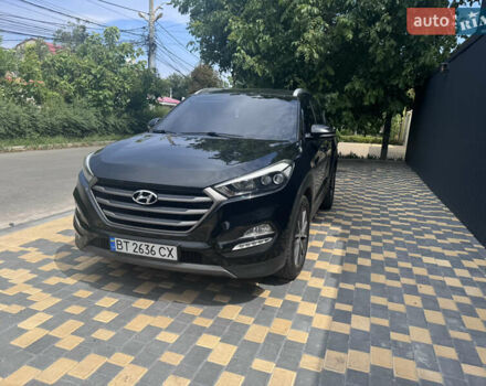 Чорний Хендай Туксон, об'ємом двигуна 2 л та пробігом 165 тис. км за 18500 $, фото 1 на Automoto.ua