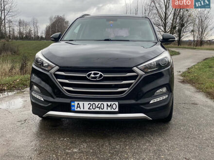 Черный Хендай Туксон, объемом двигателя 2 л и пробегом 190 тыс. км за 18000 $, фото 1 на Automoto.ua