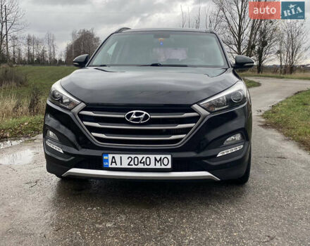 Черный Хендай Туксон, объемом двигателя 2 л и пробегом 190 тыс. км за 18000 $, фото 1 на Automoto.ua