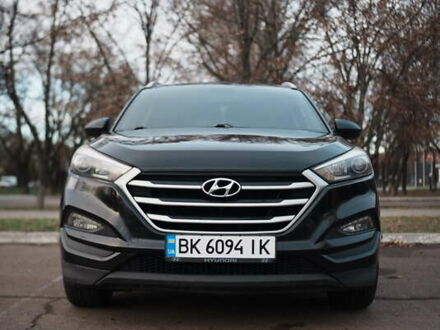 Черный Хендай Туксон, объемом двигателя 2 л и пробегом 215 тыс. км за 13999 $, фото 1 на Automoto.ua