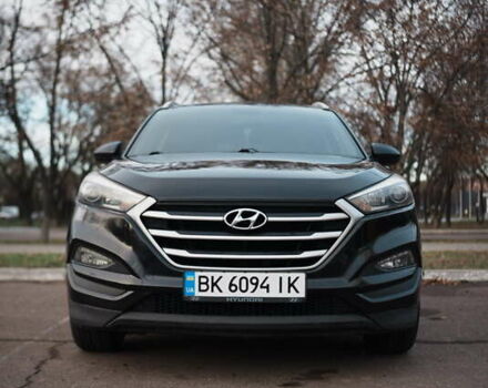 Черный Хендай Туксон, объемом двигателя 2 л и пробегом 215 тыс. км за 13999 $, фото 1 на Automoto.ua
