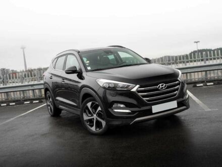 Черный Хендай Туксон, объемом двигателя 2 л и пробегом 97 тыс. км за 9300 $, фото 1 на Automoto.ua
