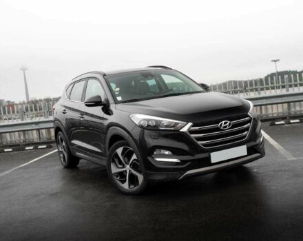 Черный Хендай Туксон, объемом двигателя 2 л и пробегом 97 тыс. км за 9300 $, фото 1 на Automoto.ua