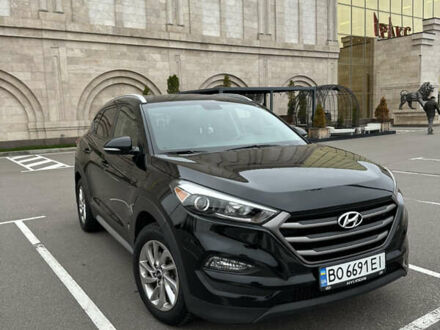 Черный Хендай Туксон, объемом двигателя 2 л и пробегом 120 тыс. км за 17800 $, фото 1 на Automoto.ua