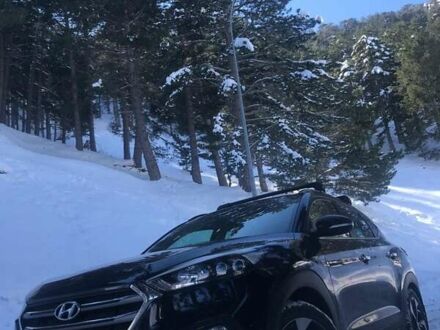 Черный Хендай Туксон, объемом двигателя 2 л и пробегом 71 тыс. км за 19999 $, фото 1 на Automoto.ua