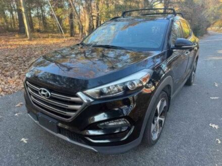 Черный Хендай Туксон, объемом двигателя 1.6 л и пробегом 99 тыс. км за 9600 $, фото 1 на Automoto.ua