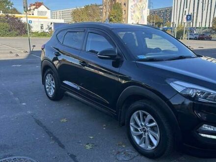 Черный Хендай Туксон, объемом двигателя 1.69 л и пробегом 155 тыс. км за 16500 $, фото 1 на Automoto.ua