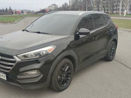 Чорний Хендай Туксон, об'ємом двигуна 2 л та пробігом 143 тис. км за 18000 $, фото 1 на Automoto.ua