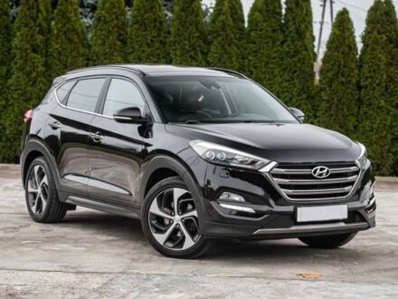 Черный Хендай Туксон, объемом двигателя 2 л и пробегом 137 тыс. км за 12800 $, фото 1 на Automoto.ua