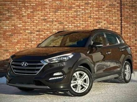 Черный Хендай Туксон, объемом двигателя 2 л и пробегом 131 тыс. км за 10400 $, фото 1 на Automoto.ua
