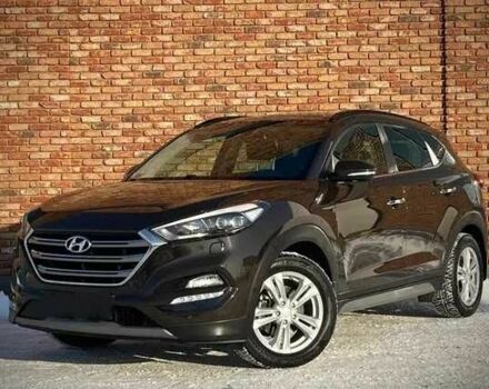 Чорний Хендай Туксон, об'ємом двигуна 2 л та пробігом 131 тис. км за 10400 $, фото 1 на Automoto.ua