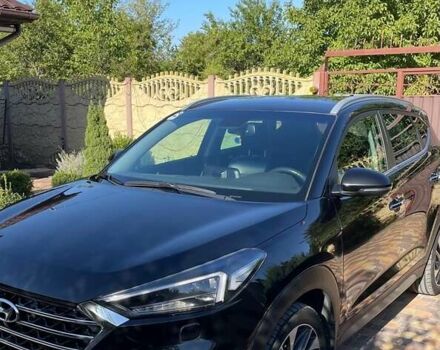 Чорний Хендай Туксон, об'ємом двигуна 2 л та пробігом 140 тис. км за 21300 $, фото 1 на Automoto.ua