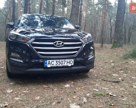 Чорний Хендай Туксон, об'ємом двигуна 2 л та пробігом 100 тис. км за 17200 $, фото 1 на Automoto.ua