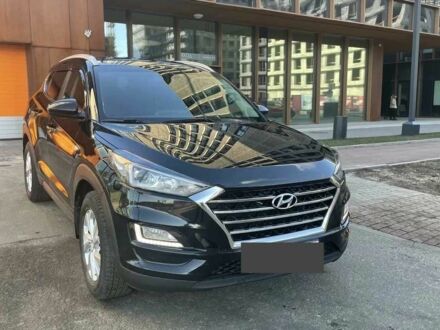 Черный Хендай Туксон, объемом двигателя 2 л и пробегом 119 тыс. км за 9900 $, фото 1 на Automoto.ua