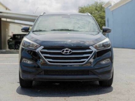 Черный Хендай Туксон, объемом двигателя 2 л и пробегом 89 тыс. км за 11200 $, фото 1 на Automoto.ua