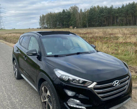 Черный Хендай Туксон, объемом двигателя 1.6 л и пробегом 87 тыс. км за 26000 $, фото 1 на Automoto.ua
