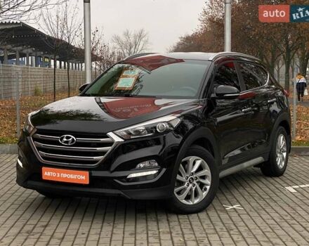Черный Хендай Туксон, объемом двигателя 2 л и пробегом 106 тыс. км за 19500 $, фото 1 на Automoto.ua