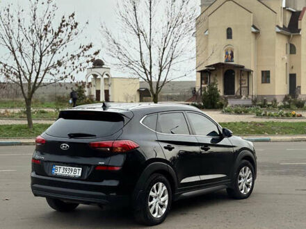 Черный Хендай Туксон, объемом двигателя 2 л и пробегом 70 тыс. км за 23000 $, фото 1 на Automoto.ua