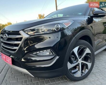 Чорний Хендай Туксон, об'ємом двигуна 2.4 л та пробігом 49 тис. км за 21500 $, фото 1 на Automoto.ua