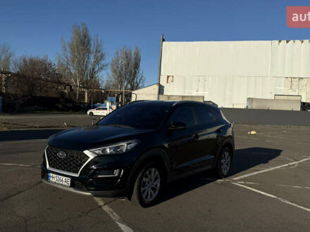 Черный Хендай Туксон, объемом двигателя 2 л и пробегом 129 тыс. км за 21600 $, фото 1 на Automoto.ua