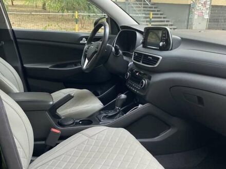 Черный Хендай Туксон, объемом двигателя 2 л и пробегом 62 тыс. км за 22500 $, фото 1 на Automoto.ua